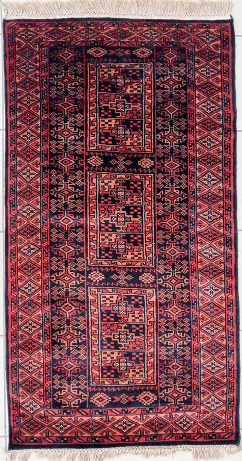 Geometric design scatter rug with Afghan-Timuri Lineage motifs