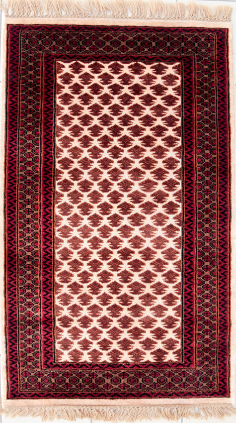 Hand made hand knotted scatter rug with geometric design