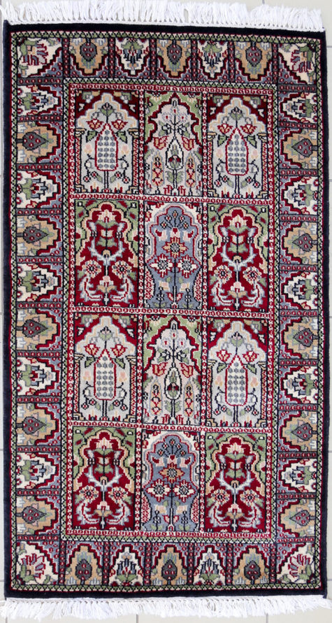 Handmade hand knotted wool silk area rug with geometric design