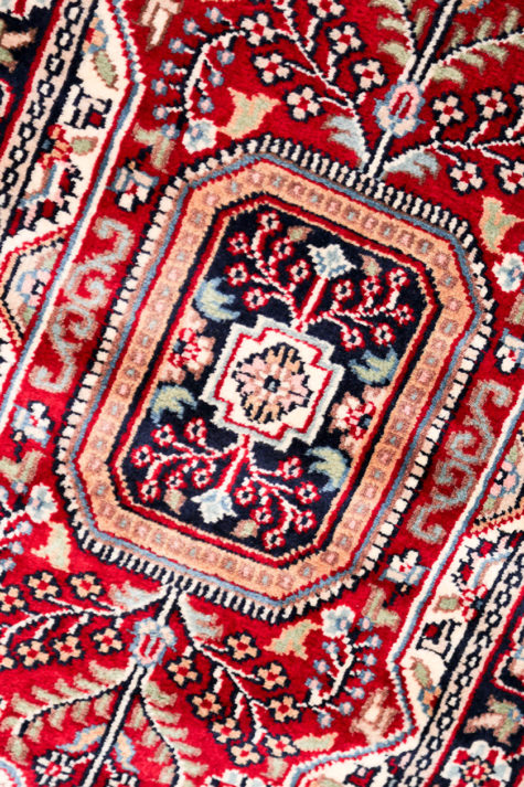 handmade red bedside rug