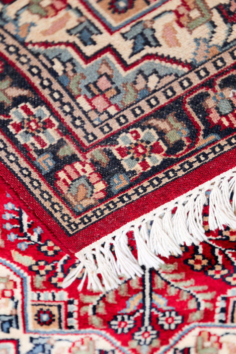 handmade red bedside rug