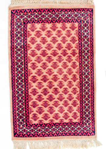 Golden bedside rug with geometric design