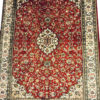 red hand knotted coffee table rug