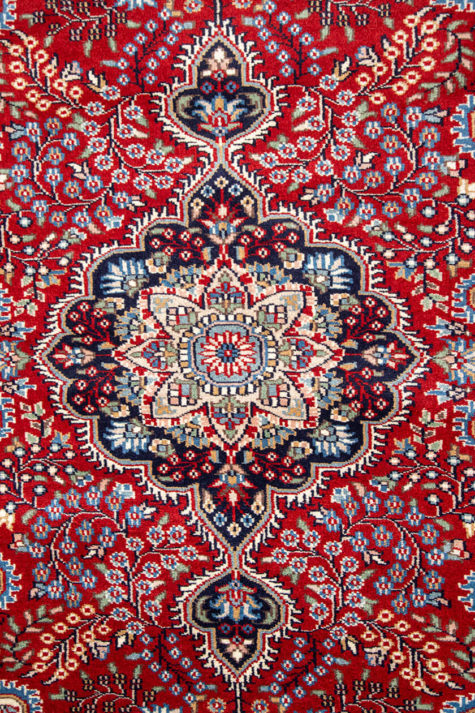 Persian red coffee table rug