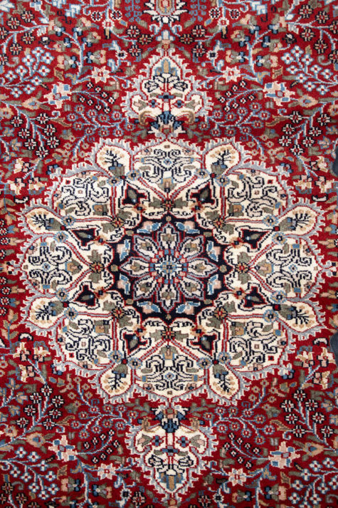 red handmade hand-knotted coffee table rug