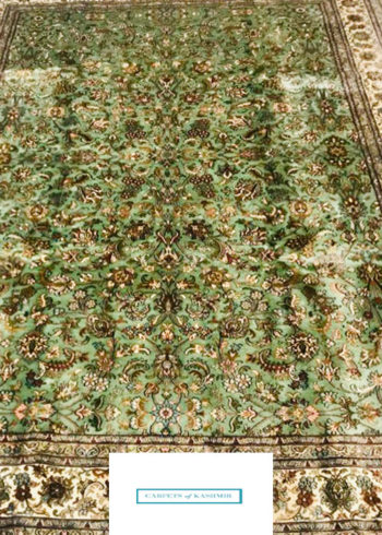 green handmade 7 by 5 rug