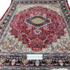 red handmade hand-knotted oriental carpet