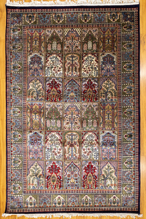 navy blue hand-knotted Kashmiri rug