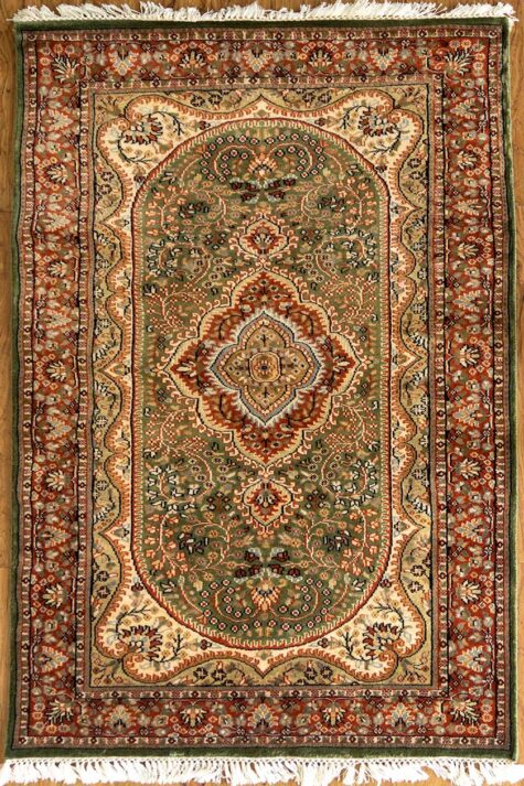 green handmade hand-knotted Kashmiri rug