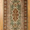 green handmade Kashmir rug
