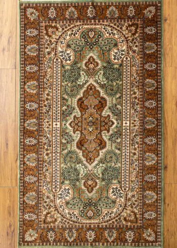 green handmade Kashmir rug