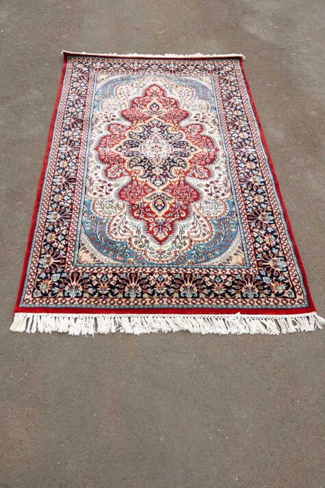 red Kashmiri made carpet