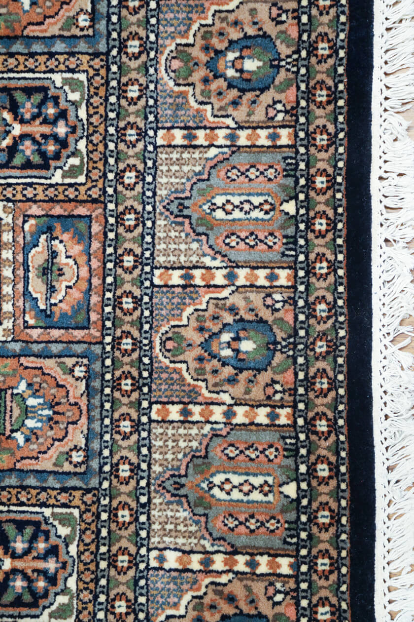 blue-geometric-panel-rug-border-and-cotton-fringe
