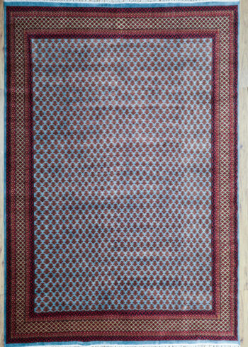 hand-knotted light blue rug cotton fringe