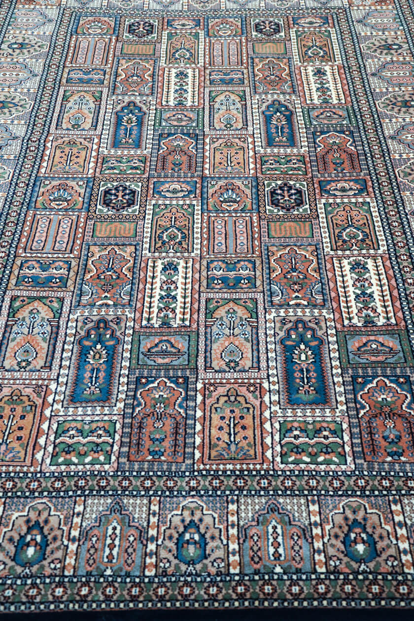 luxury-blue-geometric-panel-rug-9x6-perspective-view