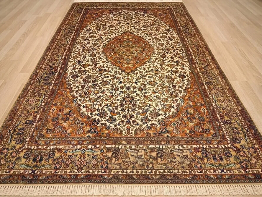 Cannoli Cream Seirafian handmade Indian rug in pure Mulberry silk with floral oriental lineage.