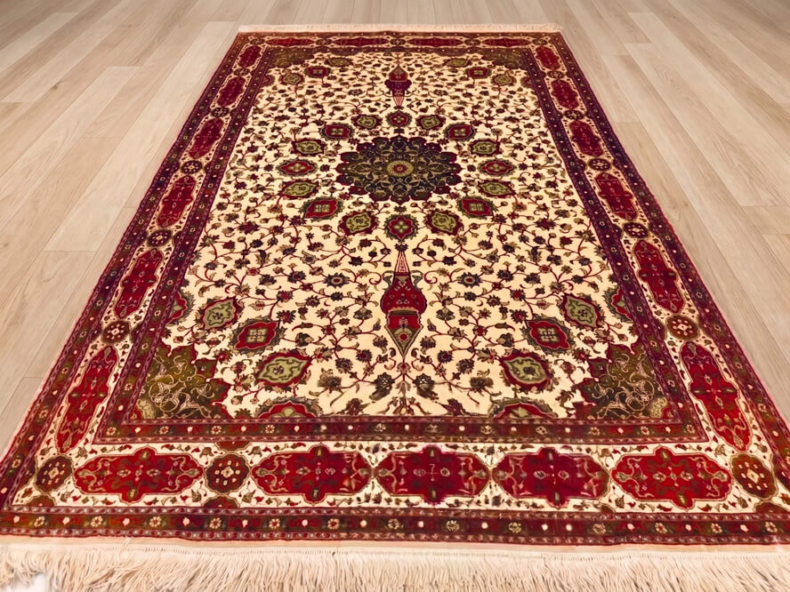 Papyrus Ardabil handmade silk rug from India with beige background and Persian lineage