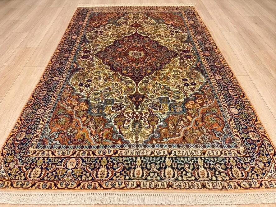 Papyrus Tabriz handmade silk rug from India with beige background and high-knot density