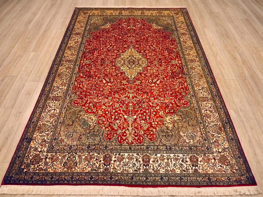 Venetian Red Ahar handmade silk carpet with a red floral design handmade in Kashmir, India