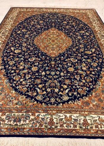 Hand-knotted Kashmiri pure silk rug in Sapphire Oval Seirafian pattern with elegant Orange highlights. 6x4 feet, 972,000 knots.