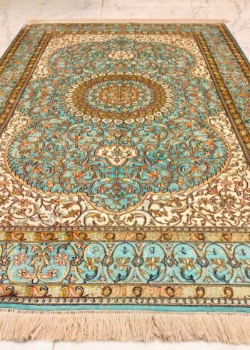 Hand-knotted Kashmiri pure silk rug in Turquoise Imperial Sarouk pattern with elegant Turquoise highlights. 6x4 feet, 972,000 knots.