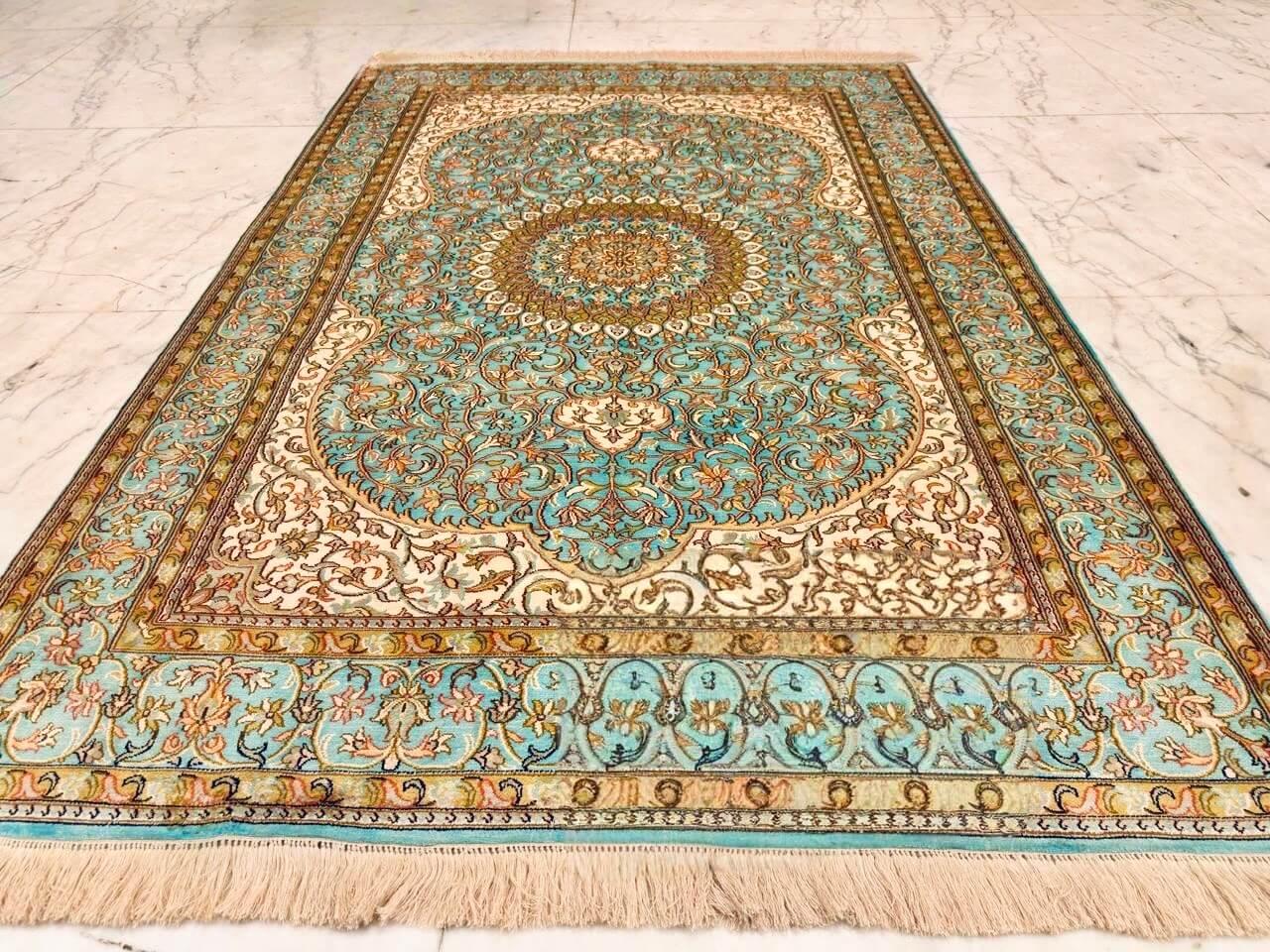 Hand-knotted Kashmiri pure silk rug in Turquoise Imperial Sarouk pattern with elegant Turquoise highlights. 6x4 feet, 972,000 knots.