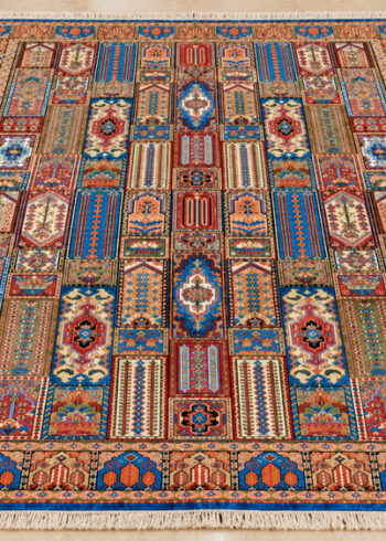 Andalusian Bakhtiari wool-silk rug with a peach background, measuring 6 x 4 feet.
