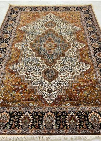 Antique Amber Isfahan wool-silk rug with a beige background, measuring 6 x 4 feet.