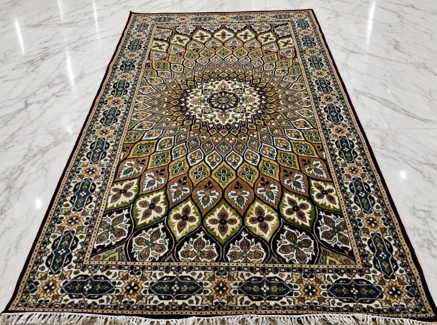 Burnished Copper Shahzaneen wool-silk rug with a black background, measuring 6 x 4 feet.