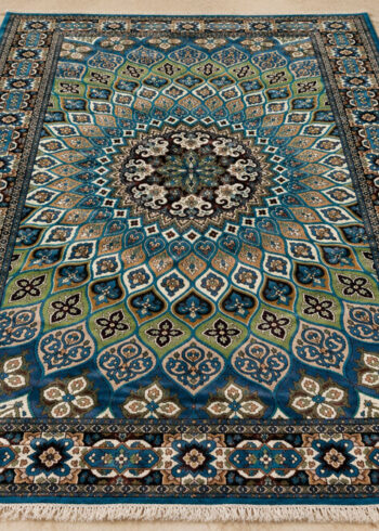 Cerulean Jewel Shahzeen wool-silk rug with a turquoise blue background, measuring 6 x 4 feet.