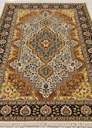 Saffron Dynasty Isfahan wool-silk rug with a beige background, measuring 6 x 4 feet.